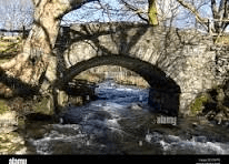 Une image contenant plein air, arbre, bâtiment, Pont en arc

Description générée automatiquement